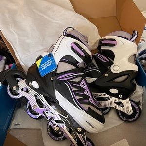 Purple size large (3y-6y US) light up skates